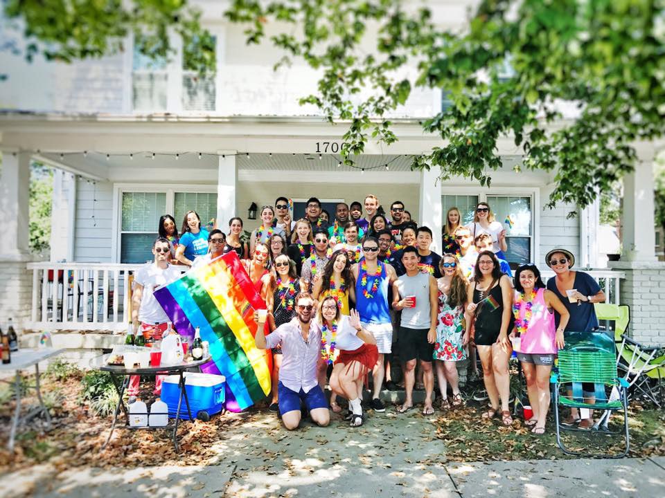 Students gather for a party to watch the Pride Parade in Durham